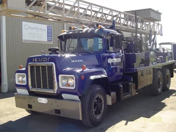 WellDrillers rotary drilling rig A working on site