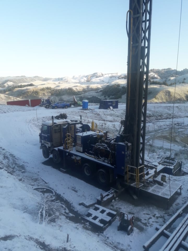 winter rig WellDrillers drilling rig working through snow on a Whanganui hill-country site